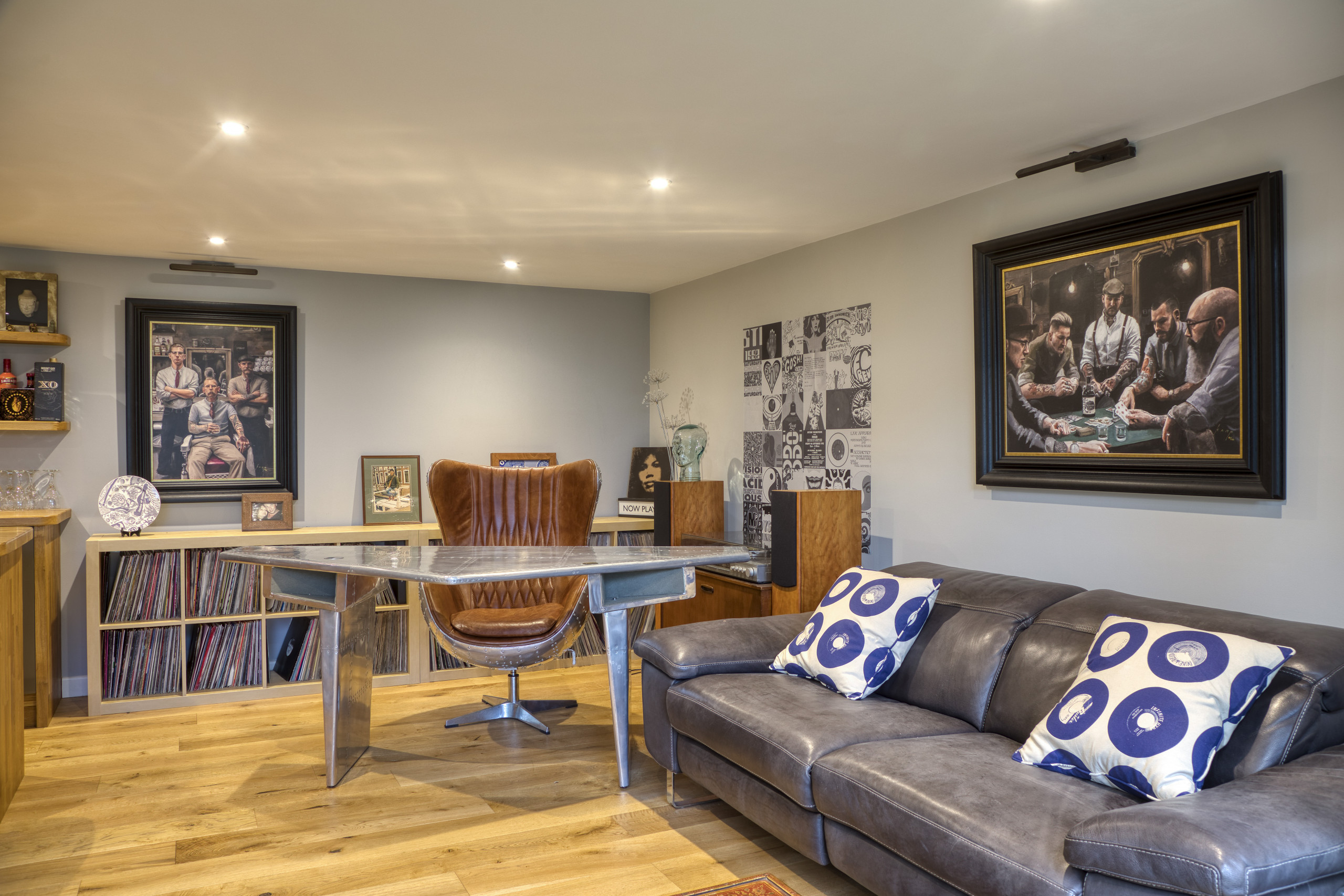 Comfortable family lounge in a garden room by Into The Garden Room